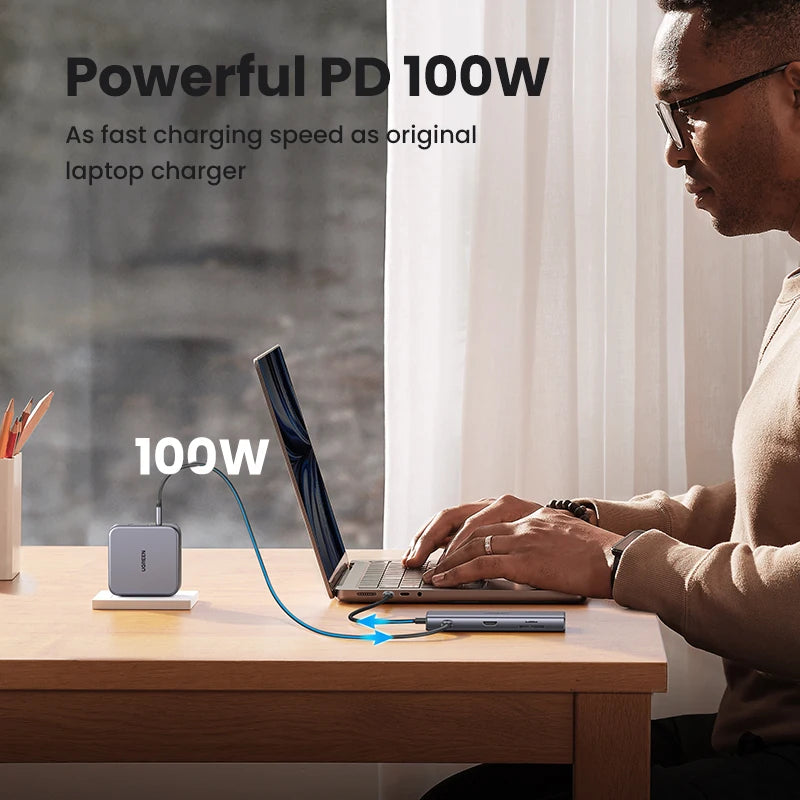 UGREEN 9-v-1 USB-C Hub s 4K60Hz HDMI, 10Gbps USB-vrati, gigabitnim Ethernetom, PD100W